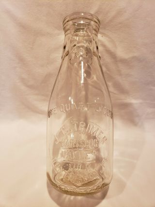Pennsylvania Embossed Quart Milk Bottle,  J.  E.  Trimer,  Huntingdon,  Pa