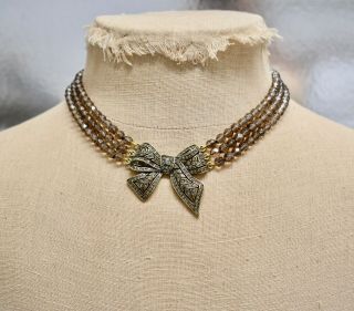 Heidi Daus " Bow Tie Affair " Necklace Smoky Quartz & Clear Swarovski Crystal