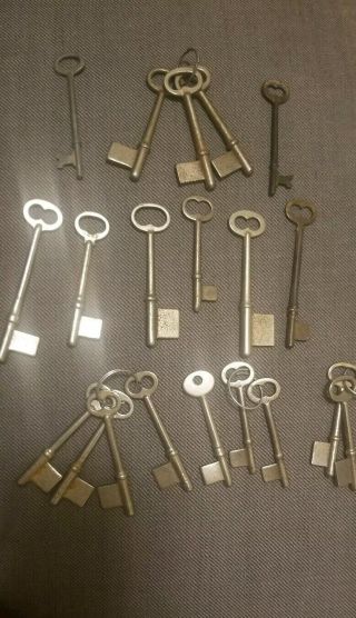 Eighteen (18) Vintage Skeleton Key Blanks And Two Skeleton Keys.