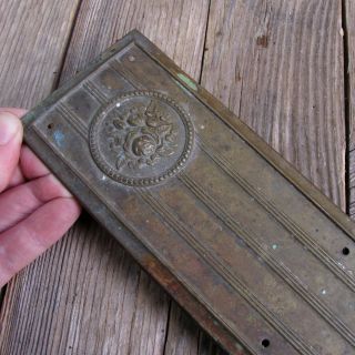 Antique Pressed Brass Single Door Finger Push Plate With Flower Detail
