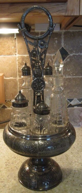 Antique Silverplate Condiment/caster Set With Glass Bottles