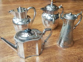 Three Victorian Silver Plated Hot Water Jugs & A Silver Plated Teapot