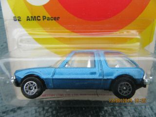 A Corgijuniorsno.  62 Amc Pacer.  Met:blue.  In A Carded Bubble Pack