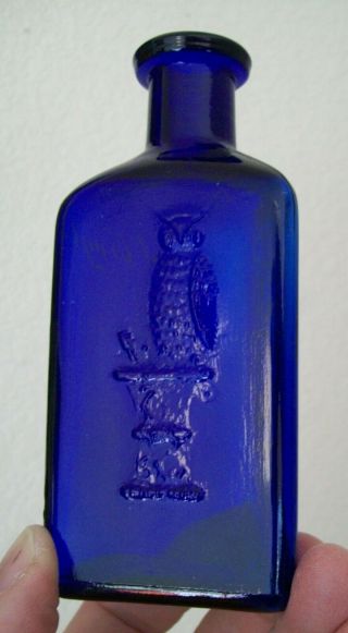 Near 4 7/8” Dark Cobalt Blue 1 Wing Owl Drug Co.  Triangular Poison Bottle