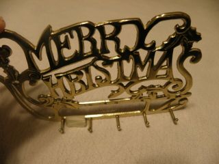 Brass stocking or key holder 3