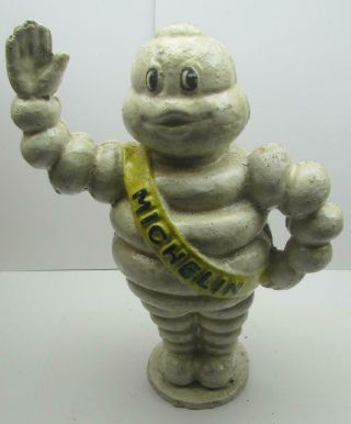 Michelin Man Cast Iron Coin Bank