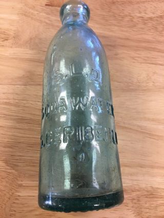 S.  L.  O.  Soda Water S.  Ceribelli Ca Gravitating Glass Stopper Hutch Bottle