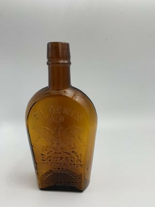 Phoenix Old Bourbon Whiskey Ambrer Flask - Bottle Dates 1880 - 1890