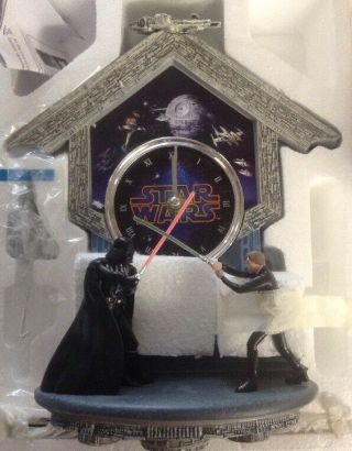 Star Wars: Sith Vs.  Jedi Wall Clock With Light Up Lightsaber Duel And Theme Song