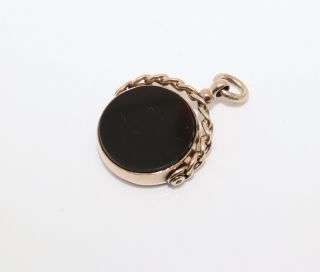 A Fine Antique Edwardian C1910 9ct Rose Gold Onyx Crested Spinner Fob Pendant
