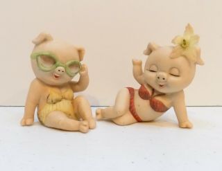 2 Vintage Enesco Ceramic Sun Bathing Pig Figurines In Bathing Suits