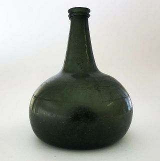 A Fine 18th Century Dutch Onion Black Glass Wine Bottle,  Circa 1730