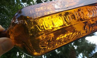 1800s Antique J.  A.  Gilka Bottle Crude Whittled Honey - Amber Color
