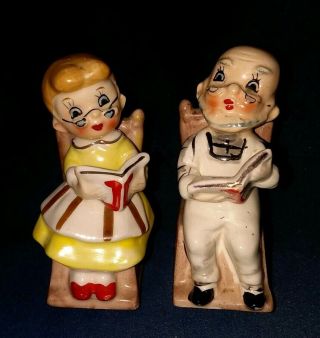 Man And Woman Reading In Rocking Chairs Salt And Pepper Shakers Japan