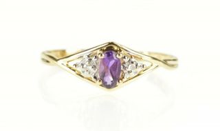 10k Oval Amethyst Diamond Accent February Ring Size 6.  25 Yellow Gold 75