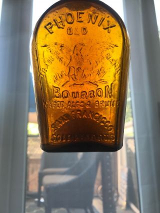 Western Phoenix Old Bourbon Whiskey Flask San Francisco Amber Gold Glass 6.  5”