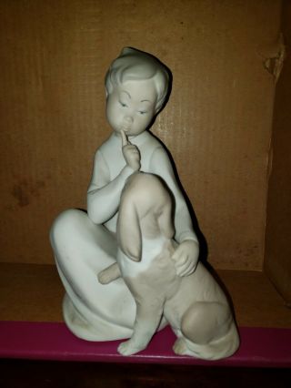 10.  Lladro Figurine Boy With Dog 4522