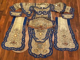 A Suite Of Antique Chinese Embroidered Silk Court Finery
