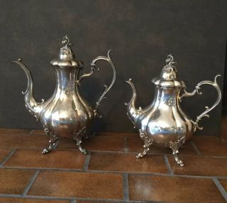 Two 1950s Rococo Revival Reed & Barton Winthrop Teapots