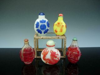 Group Of Antique Chinese Carved Glass Snuff Bottles And Stoppers