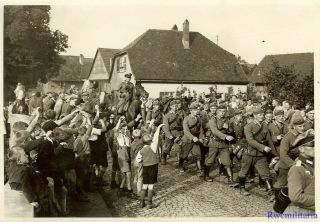 Press Photo: Early Days Villagers Welcome Passing Wehrmacht Infantry Truppe