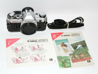 Canon AE - 1 35mm SLR Film Camera Body VTG,  Manuals & Battery 3