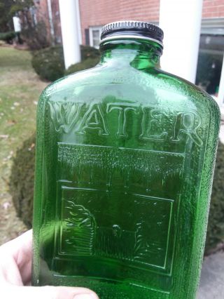 Hemingray Green Glass Waterfall Pattern 1 Quart Sized Refrigerator Bottle.