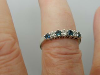 A Stunning 9 Ct Gold Blue Zircon And Diamond Ring