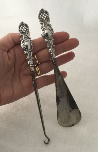 Antique Solid Silver Handle Repousse Pierced Shoe Horn And Boot Hook.