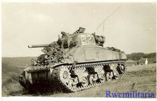Best Us M4 Sherman Tank W/ Tanker Resting On Front In French Field; 1944