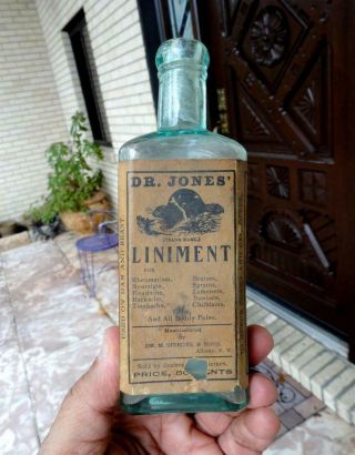 Dr.  Jones Liniment Embossed Beaver Medicine Bottle W/ Label Albany,  Ny 1800 