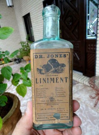 Dr.  JONES LINIMENT Embossed BEAVER Medicine Bottle w/ LABEL Albany,  NY 1800 ' s 2