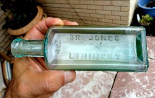 Dr.  JONES LINIMENT Embossed BEAVER Medicine Bottle w/ LABEL Albany,  NY 1800 ' s 3
