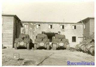 Us M4 Sherman Tanks Lined Up By Building In Captured German Town
