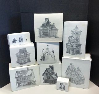 Grouping Of (9) Dept 56 North Pole Series Lighted Buildings And Figures - See Ad