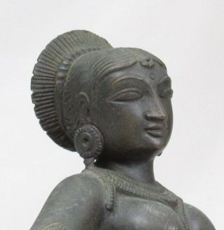 D025: Tibetan Buddhist statue of copper ware with appropriate work. 3
