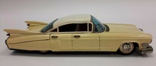 Vintage 1959 Yellow Cadillac Tin Friction Toy Car By Bandai Made In Japan