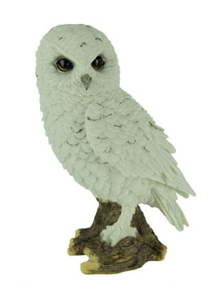 White Snowy Owl Perched On Branch Statue