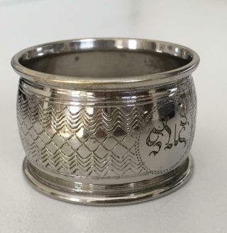 Heavy Victorian silver napkin ring with very strange engraving.  Can you identify? 3