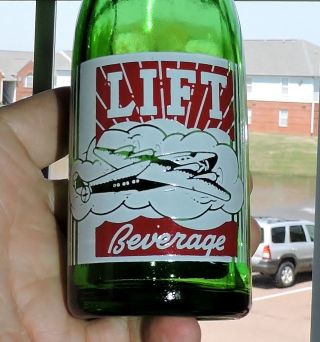 1591 Vintage 1956 Green Glass Red White Acl Lift Beverages Soda Bottle Airplane