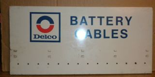 Old Painted Tin Sign Delco Battery Cables