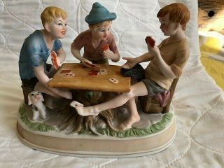Group of 3 Boys Playing Cards - The Cheaters Poker Game - In 