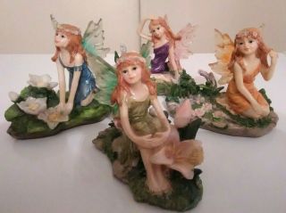 Mystical Fairy Faeries Figurine Set Of 4 Green Blue Orange & Purple