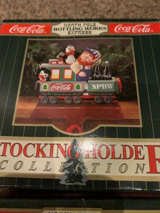 CHRISTMAS COCA COLA NORTH POLE TRAIN STOCKING HOLDER SET OF 4 1995 2