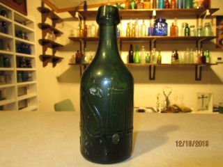 Roussel.  E Bottle,  blob top soda.  green 2