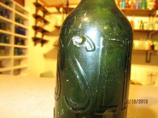 Roussel.  E Bottle,  blob top soda.  green 3