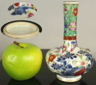A Chinese Kangxi Period (1662 - 1722) Blue & White Clobbered Bottle Vase