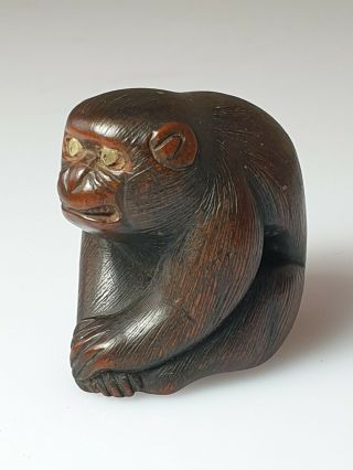 A Fine Edo Period Netsuke Of A Seated Macaque Monkey.