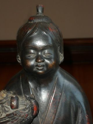 Antique 18th C Chinese Bronze Figure Holding A Carved Wooden Boat