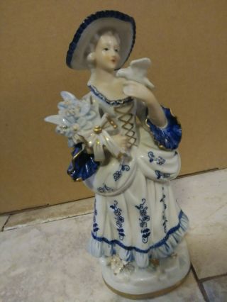 Porcelain Figurine Lady W Bird Blue White Gold Accents Floral Bouquet